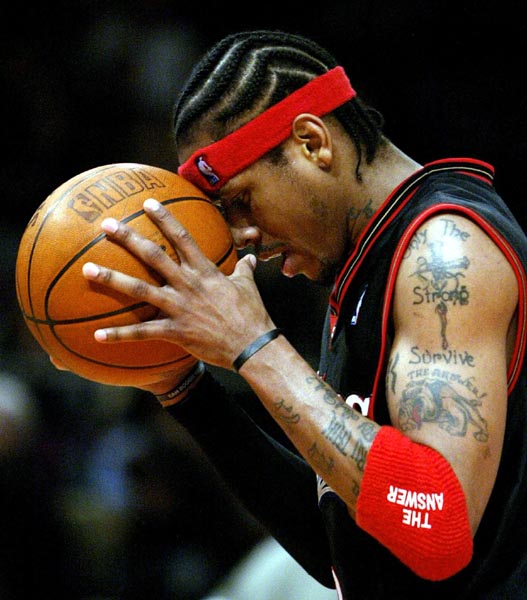 Philadelphia 76ers guard Allen Iverson reacts after he was called for a foul against the New York Knicks in the second quarter at New York's Madison Square Garden, November 16, 2002. REUTERS/Ray Stubblebine